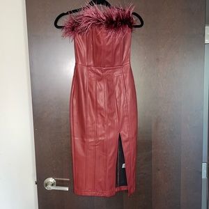 Never worn, tags still on!! Plush leather dress with fur. Size XS
